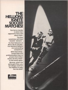 An ad for the Hellions featuring a lit match and inside the flame is a photo of soccer players